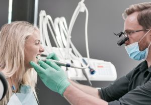 A patient with the dentist during the tooth decay treatment at Oasis Dental Studio Clinic, 2